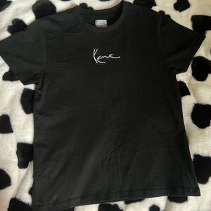 karl kani 
could be a worn as a woman’s small - believe it to be youth large